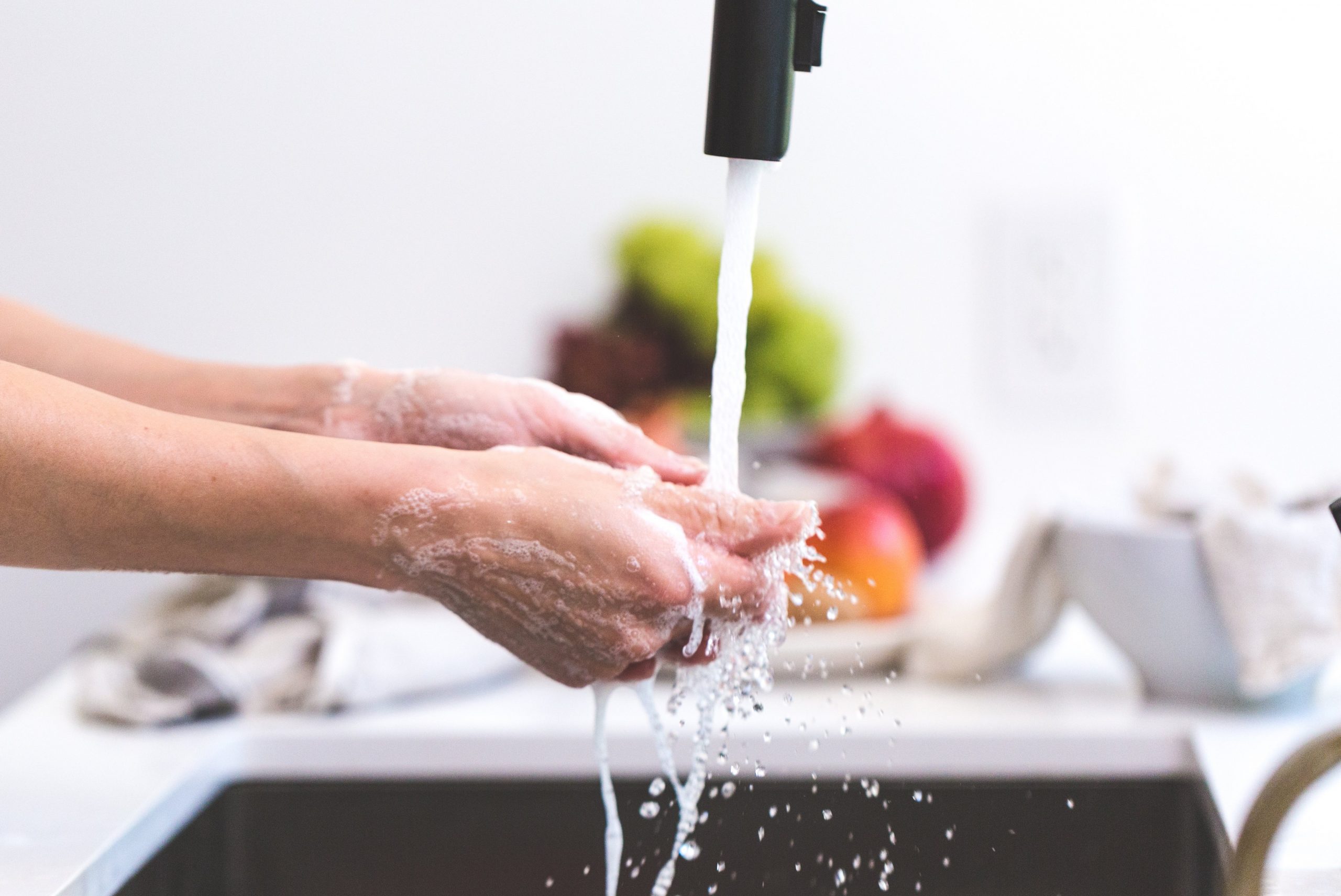 Person Washing Hands