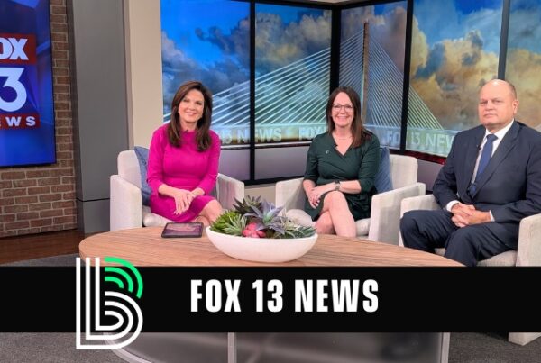 Robyn and Clinton sitting with Fox 13 for interview