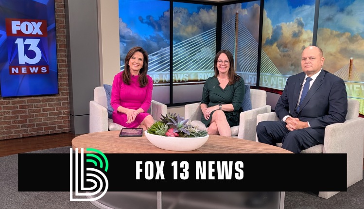 Robyn and Clinton sitting with Fox 13 for interview