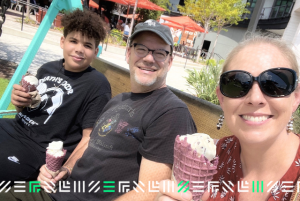 a big couple and a little having icecream