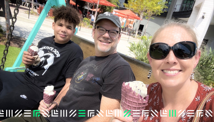 a big couple and a little having icecream